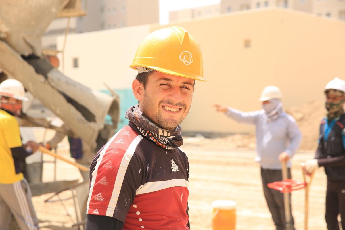 Smiling construction worker on a job site